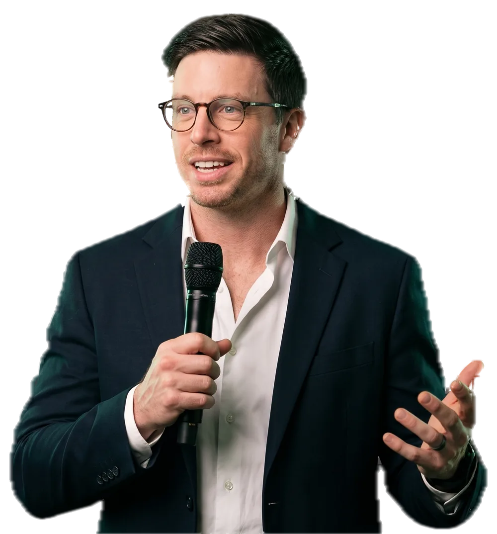 Stephen Thorn speaking with a microphone